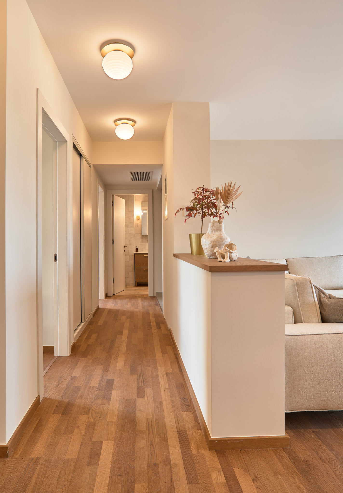 Hallway of a renovated apartment in Thessaloniki with large openings